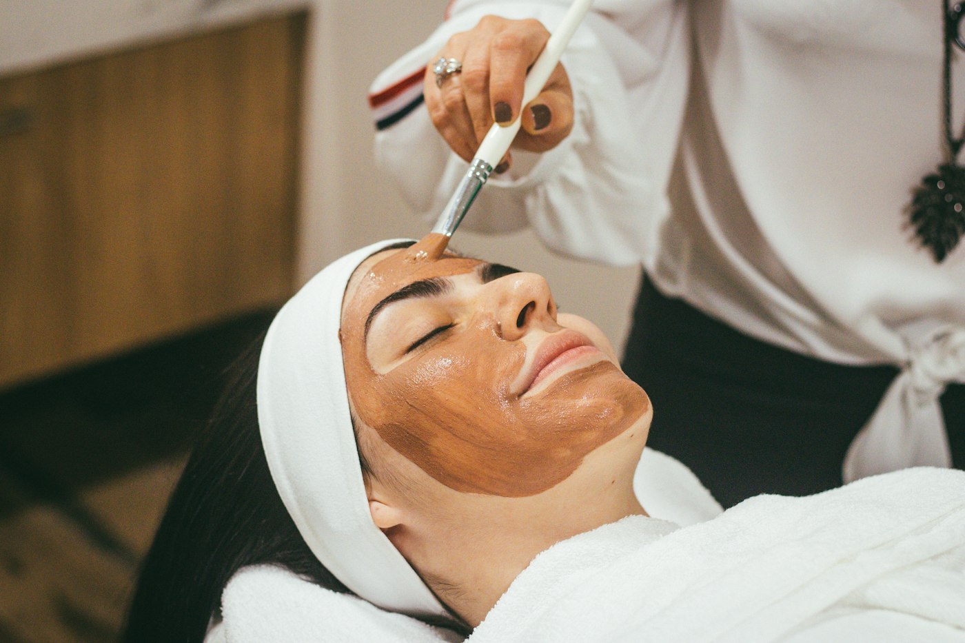Foto real ilustrativa de atendimento em dermatologia